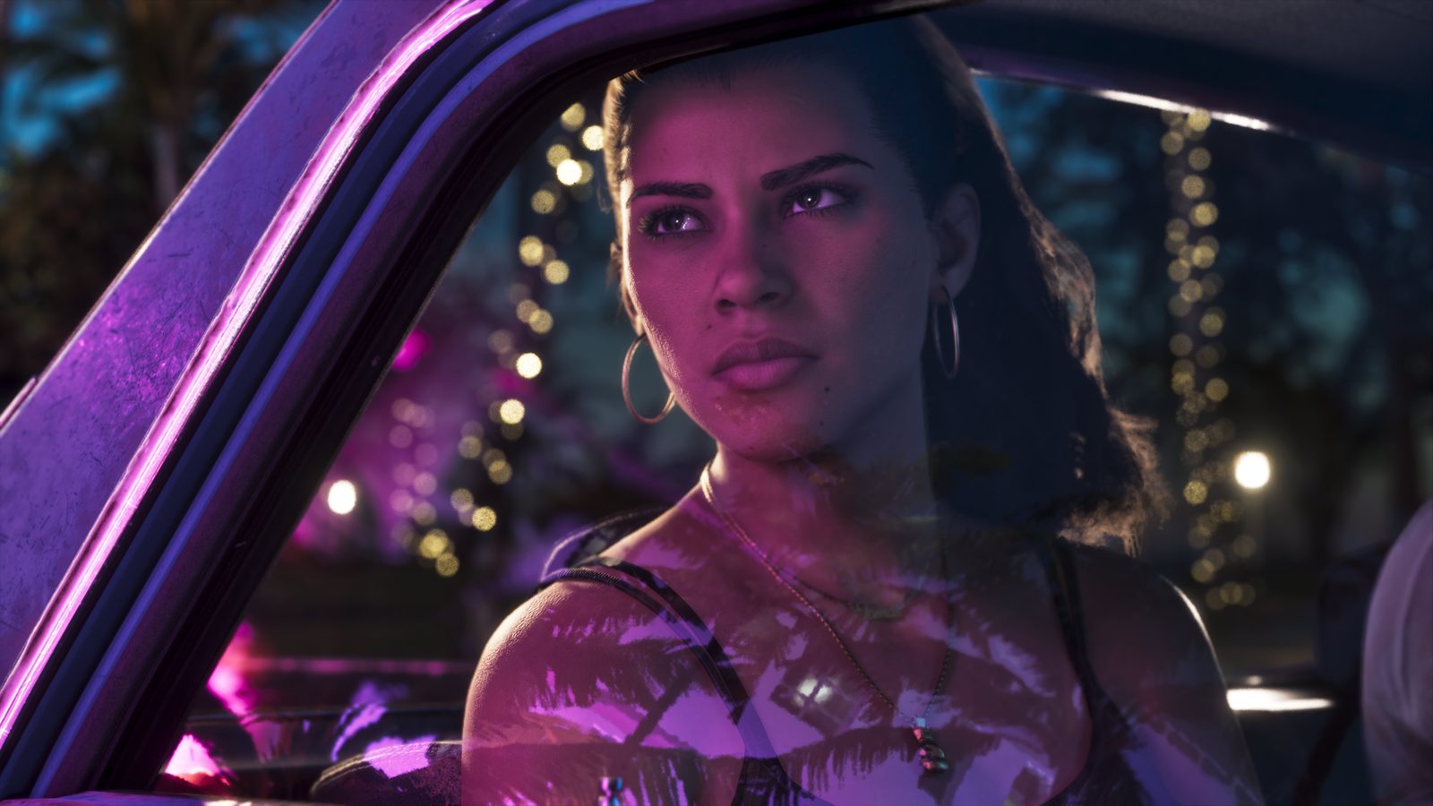 Lucia sitting in a car at night under neon light in GTA 6